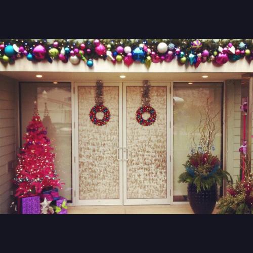 Storefront with wreaths and Christmas decorations