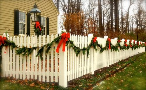 Fence with garland and bows